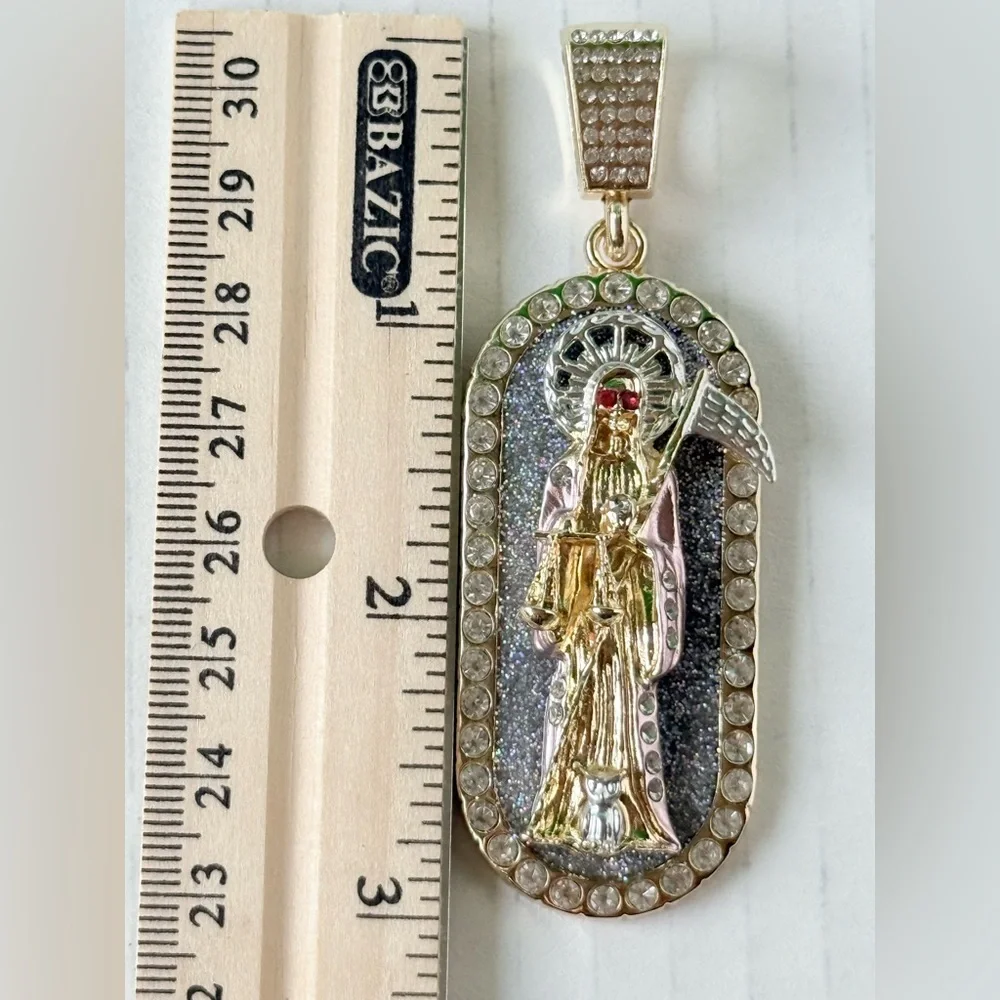 Chain‎ 24”of man with holy death medal. Laminated gold New